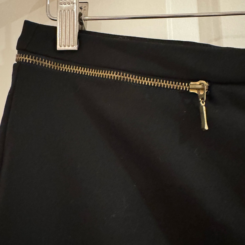 Zara black pencil skirt with good zippers details.